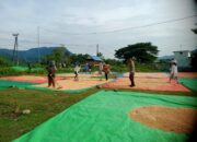 Bhabinkamtibmas Desa Woko Pantau Panen Jagung dalam Program Ketahanan Pangan Nasional